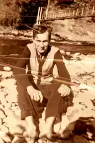 Hoeh cools feet at Belknap Springs, 1951